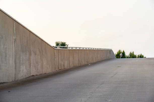 Car ramp leading up to a parking deck.