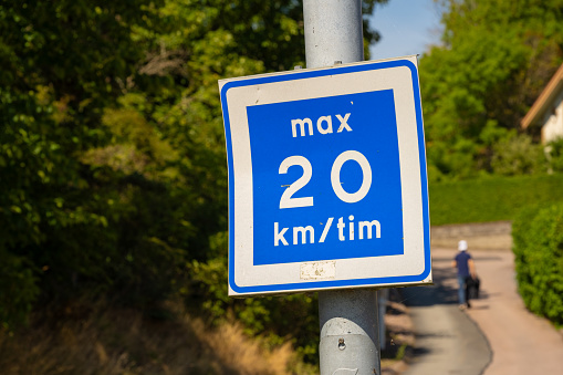 Gothenburg, Sweden - July 09 2023: Road sign recommended max speed limit of 20 kph.