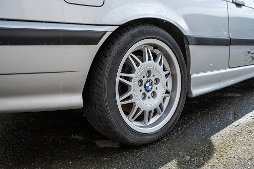 Lindesnes, Norway - August 26 2023: BMW Motorsport rims on a silver M3 car.