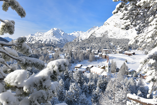 Maloja is a village on the Maloja Pass between the Upper Engadine and the Bergell in the Swiss canton of Graubünden.\nPolitically it belongs to the municipality of Bregaglia in Bergell, part of the Maloja region, but geographically it belongs to the Upper Engadine.