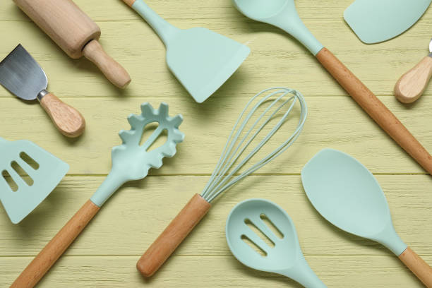 istock Set of different kitchen utensils on yellow wooden table, flat lay 1905411433