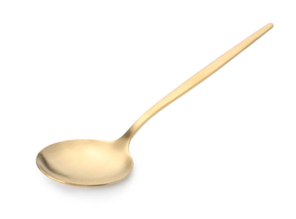 istock One shiny golden spoon isolated on white 1905412987