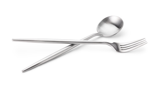 Shiny silver fork and spoon isolated on white. Luxury cutlery