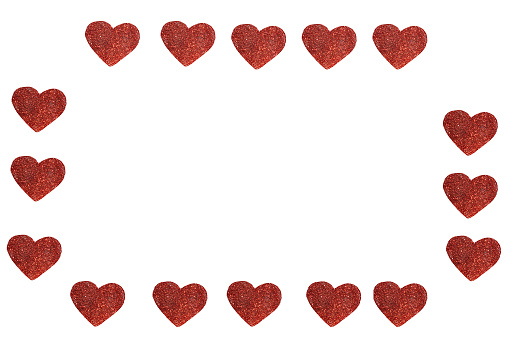 Many dark red hearts are arranged in a circle around the edges of the white sheet. Many small hearts on a white background surround the center of the image. Blanks, frame for lovers postcard.