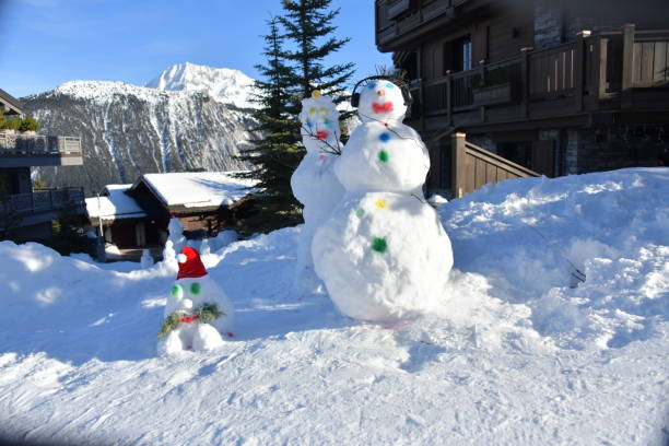 Snowman family in Courchevel ski resort made  by children