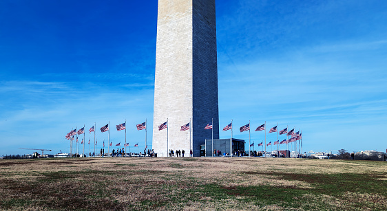 Washington, DC, USA - 12.16.2023: Washington Monument against a cloudy sky.