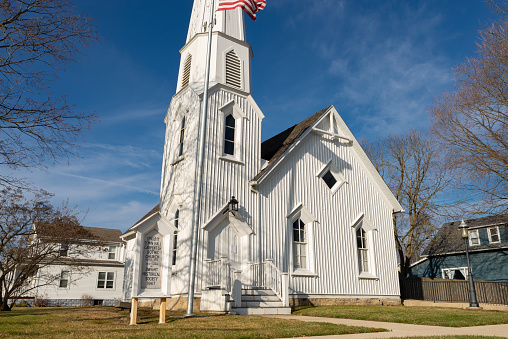 Dwight, Illinois - United States - January 2nd, 2023: Exterior of the historic Pioneer Gothic Church, built in 1857, in downtown Dwight, Illinois.