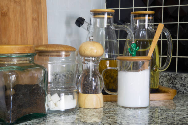 istock Marble stone stand on kitchen table with various food ingredients 1905661440