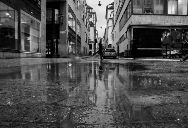 istock Close up of a puddle on a street 1905704297