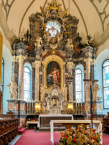 Zamosc, Poland, September 3, 2023: Interior of the Cathedral of the Resurrection of the Lord and Saint Thomas the Apostle. The main altar with the painting Saint Thomas before Jesus by J. Prechtl from 1782.