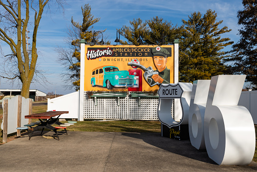 Dwight, Illinois - United States - January 2nd, 2024: Roadside attraction billboard for the historic Ambler and Becker Station on historic Route 66 in Dwight, Illinois, USA.