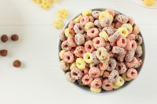Colorful Cereal Ring for Breakfast on White Table, Top View