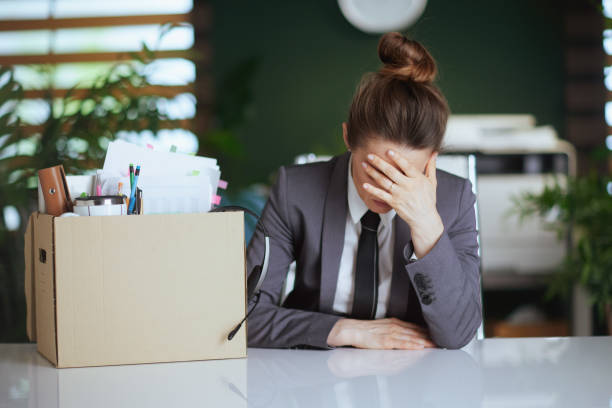 istock stressed modern woman worker in modern green office 1905832696