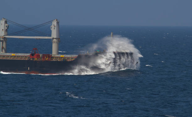 istock waves hitting the bow of a ship 1905834308