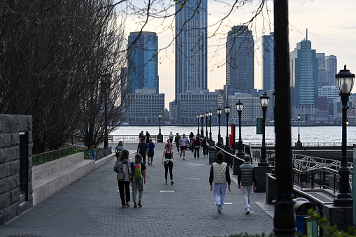 New York City, New York, USA, April 11, 2023 - Brookfield Place / Battery Park City in Manhattan with the skyline of Jersey City and the Goldman Sachs Tower, New York.