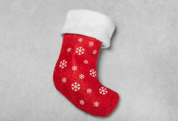 istock red christmas stocking for gifts top view 1905849107