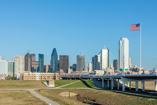 scenic skyline Panoramaof Downtown Dallas seen from Trinity River with Margaret hunt hill bridge, Texas