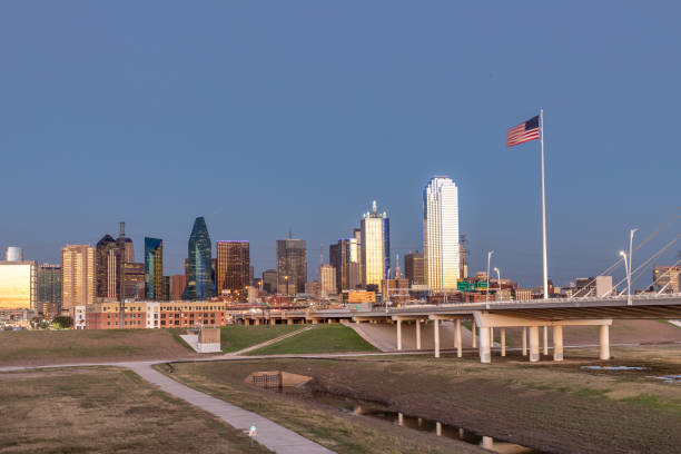 istock scenic skyline by night with modern skyscraper in Dallas, Texas, USA 1905879437