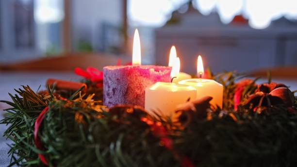 istock Christmas Advent Wreath with Lit Wax Candles 1905937390