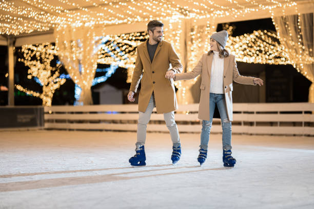 A scene from an ice skating rink in a big city in Japan.