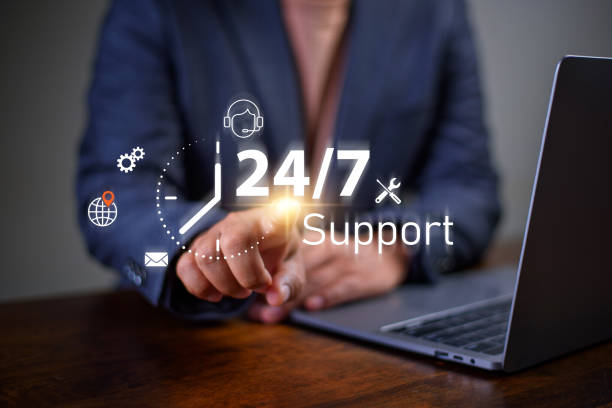 istock customer services and consulting concept, Businessman holding icon virtual 24/7 support services, Full-time available service. 1905966283