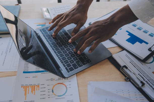 istock Finance manager meeting discussing company growth project success financial statistics, professional investor working start up project for strategy plan with document, laptop and digital tablet. 1906031105