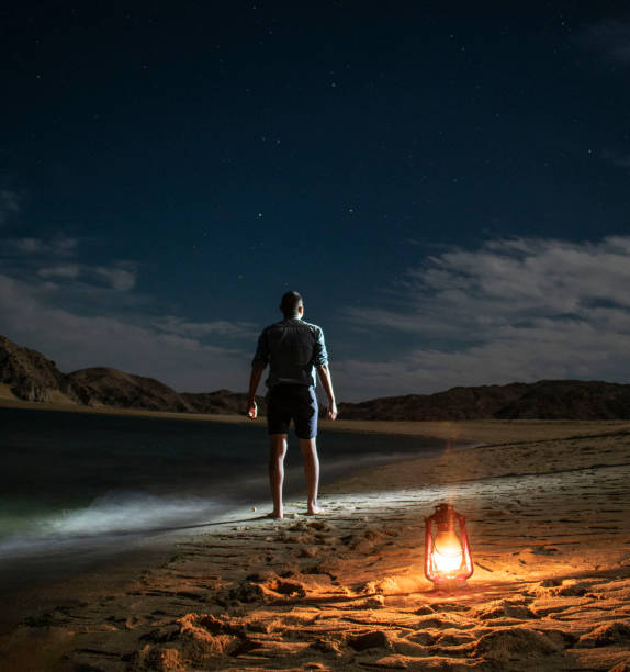 istock The Men and his own lantern. 1906058600