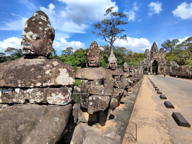 istock Statues at south gate bridge, Angkor Thom, Cambodia 1906184649