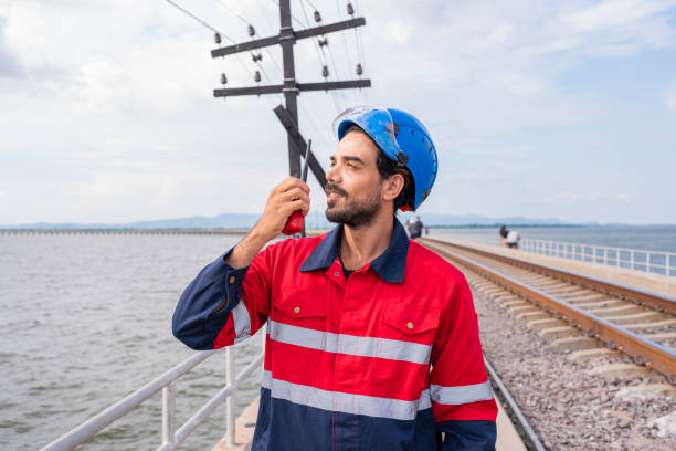 south atlantic ocean, on board ship - march 19, 2015 : crew member washing deck of a bulk carrier ship