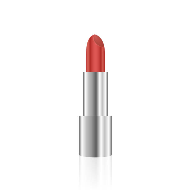 istock Red lipstick cosmetic makeup product on silver color body 1906279157