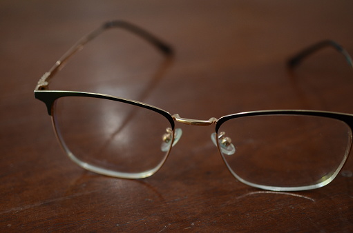 Reading glasses on a white background macro close up shot