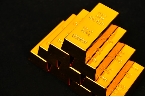 Close up gold bars on black background gold investment concept