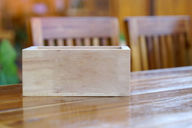 Empty wooden crate box isolated on white background