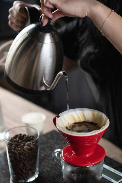 istock Barista's Making Drip Coffee with Kettle 1906410387