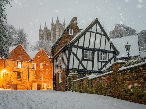 A cold and snowy morning on Michaelgate in Lincoln as the snow falls
