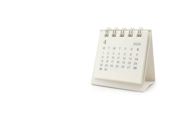 Simple desk calendar for April 2024 isolated on white background.