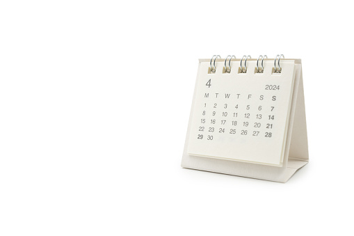 Simple desk calendar for April 2024 isolated on white background. Calendar concept with copy space. Clipping path.