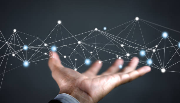 istock Hand of businessman on background holding connections system and global data exchanges. Business network connection concept. 1906488815