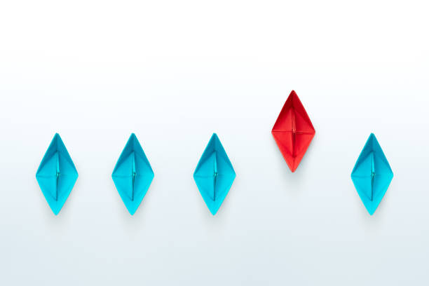 istock Business competition concept with paper ships on white background. copy space 1906490904