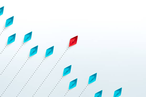 Business competition and leadership concepts with paper ships on white background. copy space