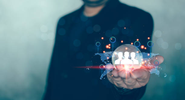 istock Businessman holding glass with a network structure world map and business digital network technology. Human icons hologram digital network 1906502241