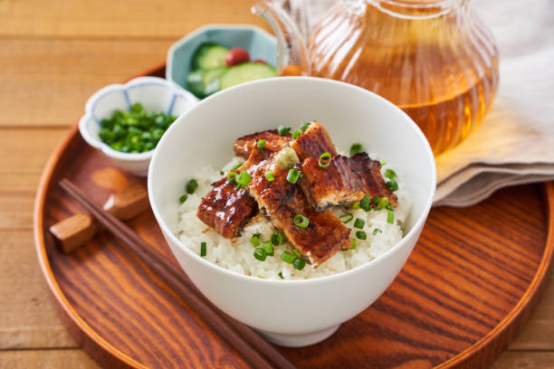 istock Japanese food : broiled eel on rice with green tea poured on top 1906508007