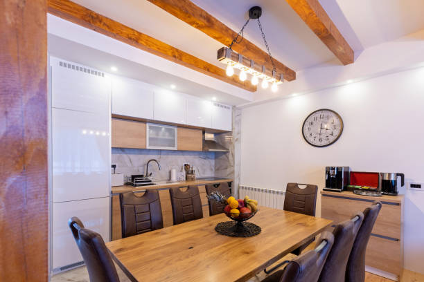 istock Kitchen interior and dining area in modern new mountain apartment 1906508546