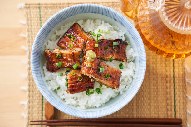 istock Japanese food : broiled eel on rice with green tea poured on top 1906509804