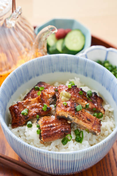 istock Japanese food : broiled eel on rice with green tea poured on top 1906510615