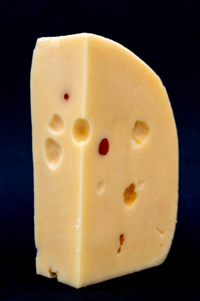 istock Fresh, delicious farm product masdam cheese. 1906561290