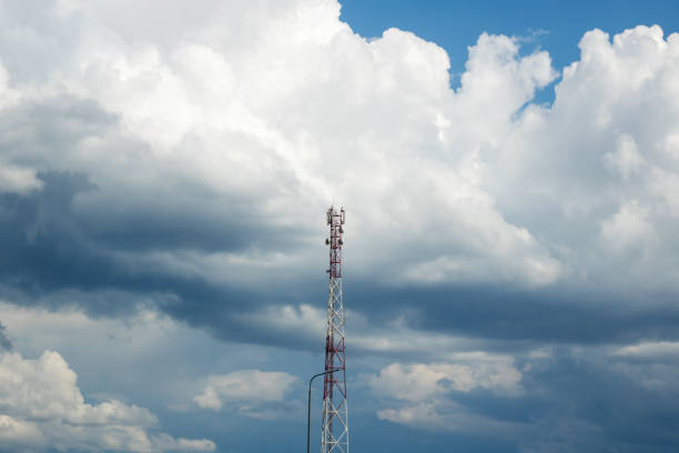 istock Pole with electric wires on sky background 1906578777