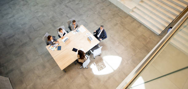 istock Aerial view at young startup team working in the office 1906585292