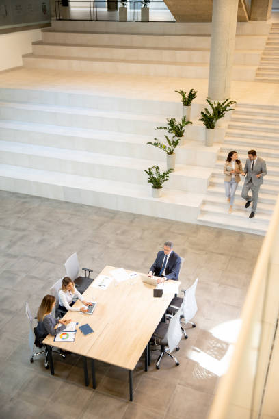 istock Aerial view at young startup team working in the office 1906610807