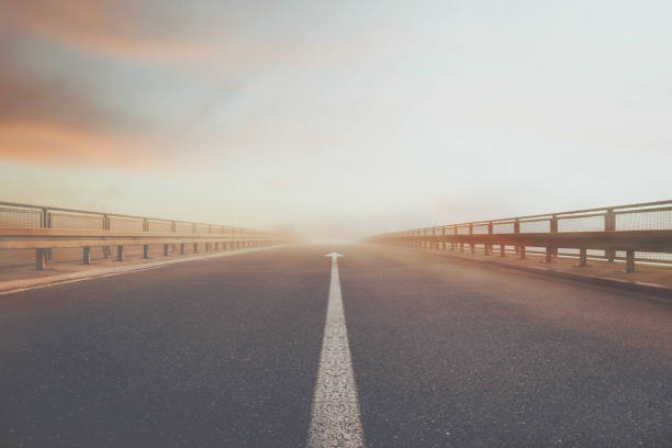surreal arrow on a road indicates the right direction to follow, abstract concept